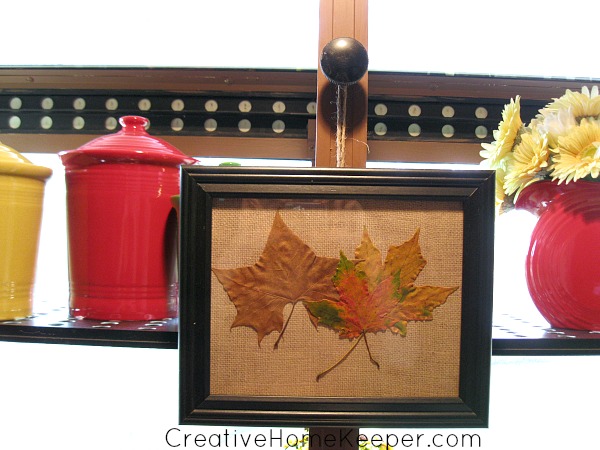 Easy DIY Pressed Leaves Wall Art: Preserving the season through pressed leaves is an easy way to add a little bit of fall around your home with this easy DIY pressed leaves wall art project. | CreativeHomeKeeper.com