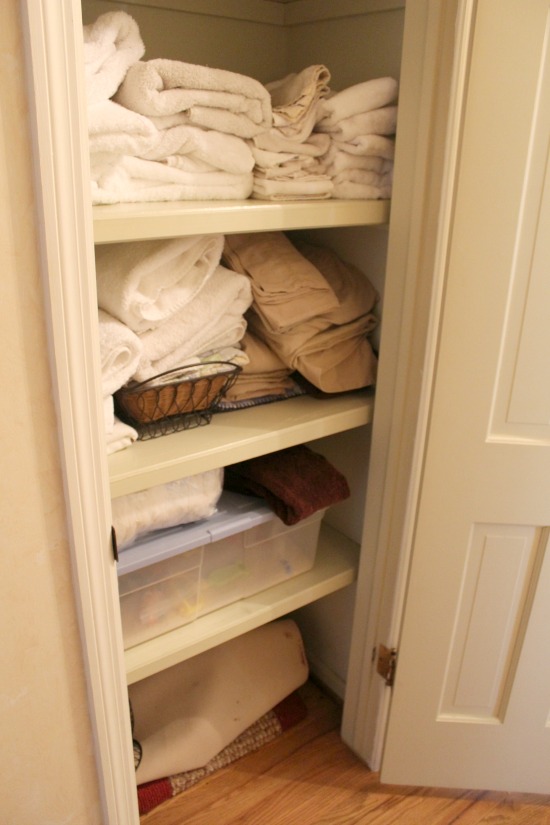 Sort through, purge and learn how to fold and store your towels & sheets with these linen closet organization tips and tricks.